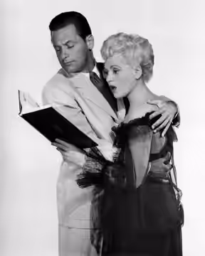 Publicity photo of William Holden and Judy Holliday for Born Yesterday (1950)