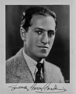 Publicity portrait of George Gershwin, with autograph.