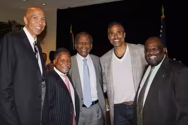 Left to right: Mychal Thompson, a guest, Sidney Poitier, Rick Fox, and another guest at the 2012 Sidney Poitier Recognition Dinner in The Bahamas