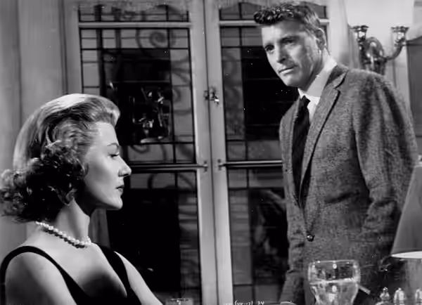 Rita Hayworth &amp; Burt Lancaster in the American drama film Separate Tables (1958). Press photo
