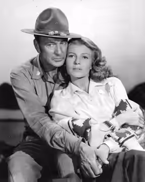 Gary Cooper &amp; Rita Hayworth in the American western film They Came to Cordura (1959)