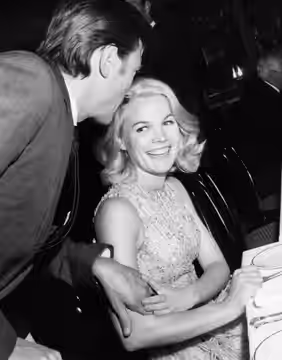 Carroll Baker with actor Laurence Harvey, ca. 1965