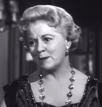 Gertrude Flynn in the TV series The Lawless Years, episode The Morrison Story (cropped screenshot) (1959)