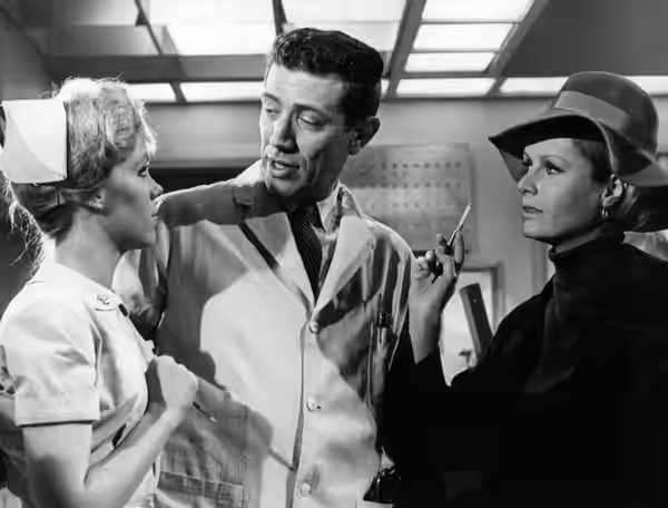 Photo of Zina Bethune, Joseph Campanella and Diana Hyland in a scene from the prime time television drama The Doctors and the Nurses. (1965)