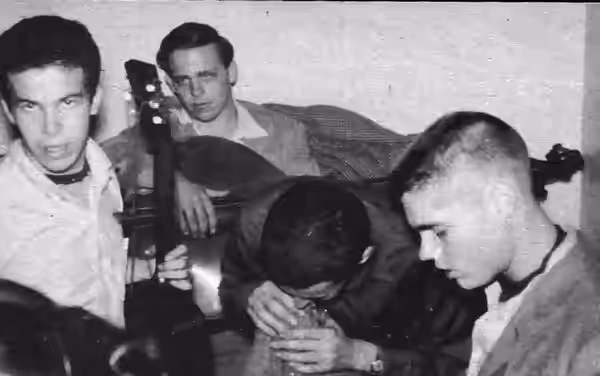 John Shahn, Peter Schickele, Dave Soifer, and Robin Christenson in image from Swarthmore College yearbook Halcyon 1957. Some have musical instruments.