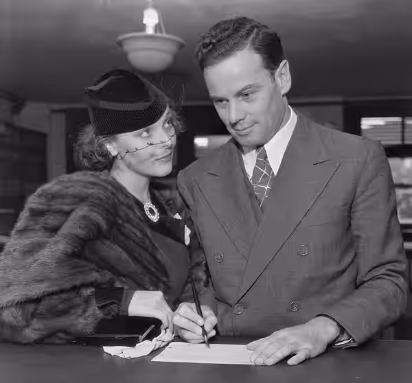 Sally Blane and Norman Foster apply for a marriage license, Los Angeles. (1935)