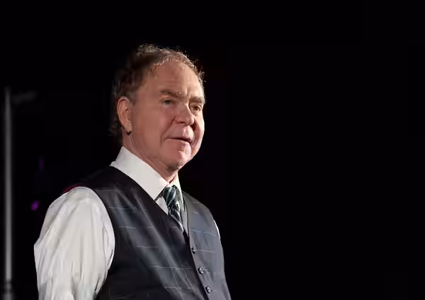 Magicians Penn and Teller perform for U.S. Airmen at the 2023 USO Holidays Tour at RAF Lakenheath, December 11, 2023. for 82 years, the USO has helped connect s