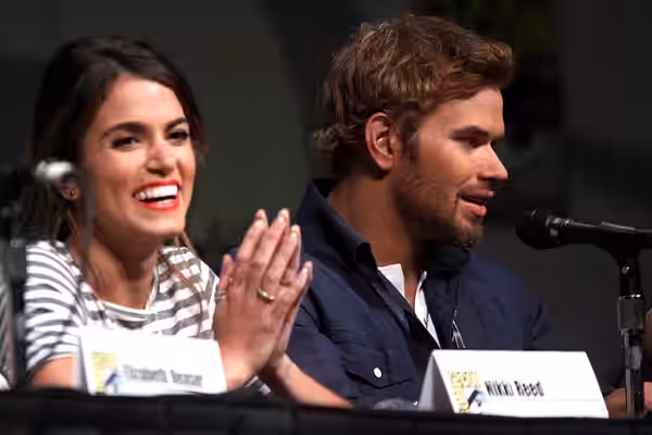 Nikki Reed &amp; Kellan Lutz speaking at the 2012 San Diego Comic-Con International in San Diego, California. Please attribute to Gage Skidmore if used elsewher
