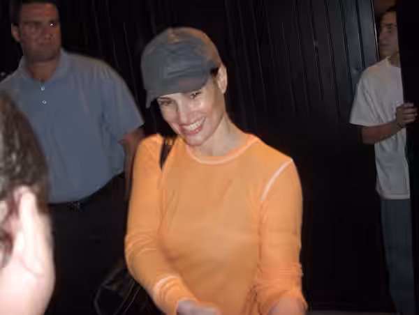 Idina Menzel coming out of stage door. (2004)