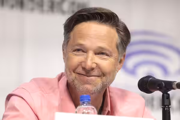 George Newbern speaking at the 2019 WonderCon, for "Justice League vs. the Fatal Five", at the Anaheim Convention Center in Anaheim, California. Please attribut