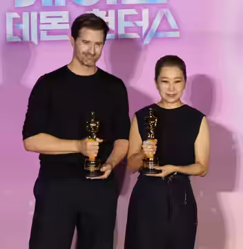 Chris Appelhans and Maggie Kang attending a press conference held at CGV Yongsan I'Park Mall in Yongsan-gu, Seoul to celebrate the Academy Award win of the movi (2026)