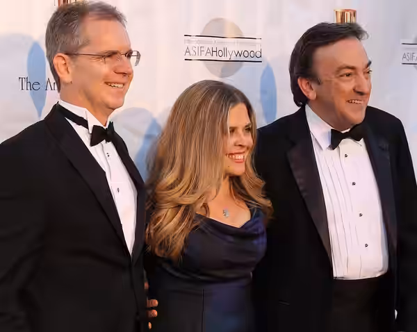 The "Frozen" team Chris Buck, Jennifer Lee, and producer Peter Del Vecho at the 41st Annual Annie Awards. (2014)