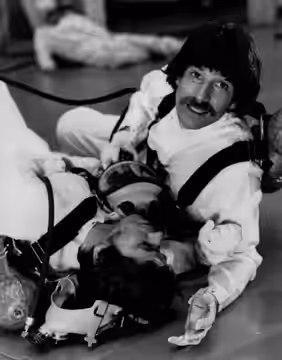 Promotional photo of Michael Brandon (top) and William Devane (bottom) in the made-for-TV adaptation of the novel Red Alert (1977)