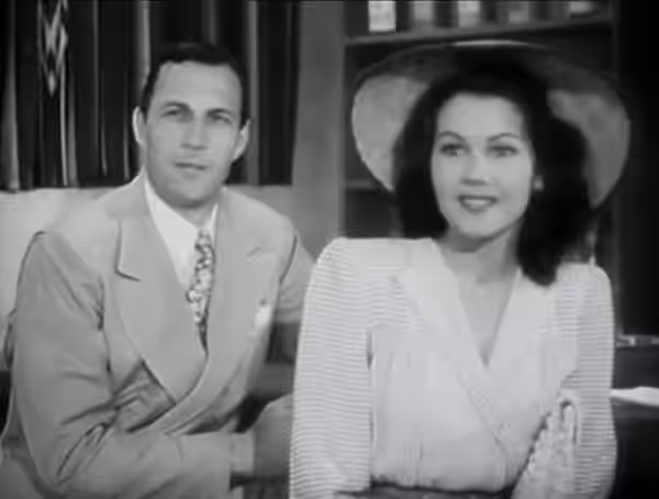 Tom Tyler and Jeanne Bates in The Phantom (1943) - cropped screenshot.