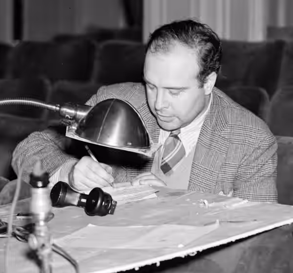 Photograph of John Houseman in Maxine Elliott's Theatre during preparations for the Federal Theatre Project 891 production of Doctor Faustus, which opened Janua