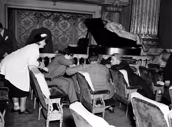 Photograph of (from left) an unknown woman, Orson Welles, John Houseman and Edwin Denby during a rehearsal of the Federal Theatre Project production of Horse Ea (1936)