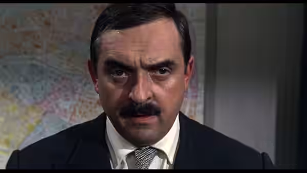 A screenshot from the film Charade (1963)