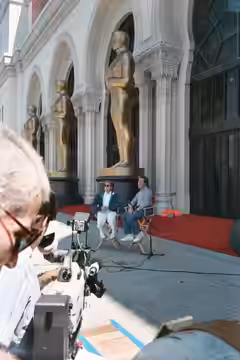 Producer Allan Carr and Director Jeff Margolis meet the press outside the Shrine Auditorium on rehearsal day for the 1989 Academy Awards - Permission granted to