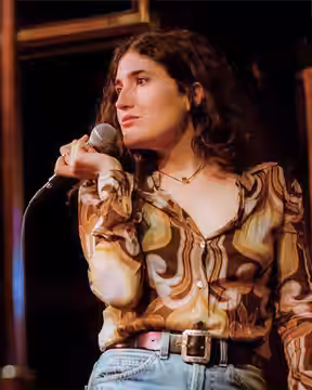 Kate Berlant performs at the Tomorrow Never Knows festival in 2019