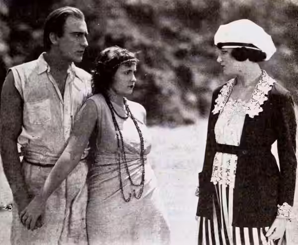 Still from the American drama film The Shark Master (1921) with Frank Mayo, May Collins, and Doris Deane, on page 55 of the September 3, 1921 Exhibitors Herald.
