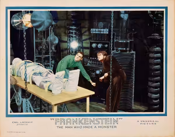 Colored lobby card for Frankenstein, featuring Colin Clive, DwightFrye and Boris Karloff. Image is assumed to be in the public domain as no copyright is in evid (1931)