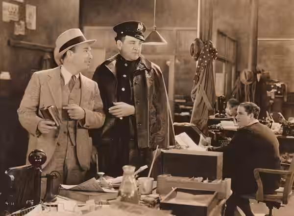 Robert Armstrong (left) and Tom Kennedy (policeman) in Big News (1929) - publicity still