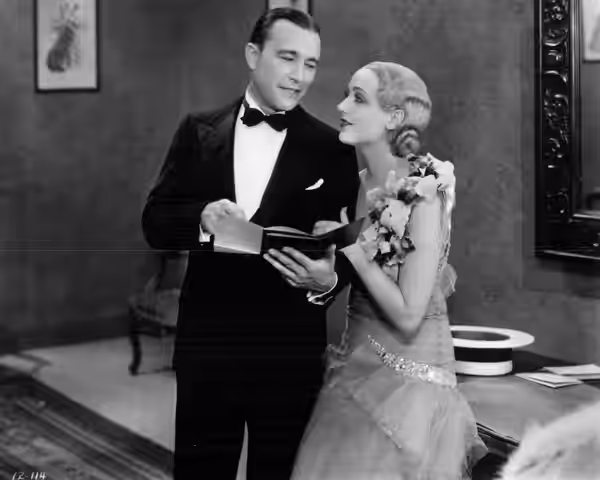 Robert Armstrong and Carole Lombard in the American Pre-Code drama film The Racketeer (1929).