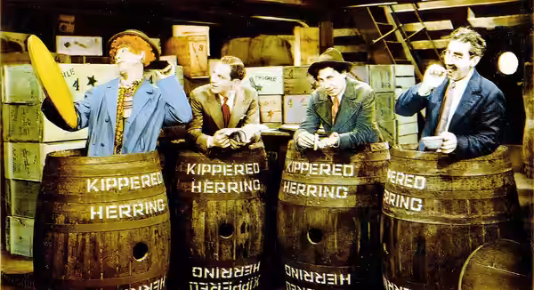 Cropped and edited lobby card from the 1931 film Monkey Business (Paramount 1931) featuring the four Marx Brothers Harpo, Zeppo, Chico and Groucho.