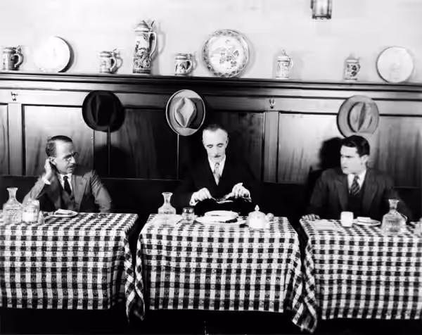 (From left) Arthur Hoyt, Lewis Stone, and Lloyd Hughes in the American romantic drama film An Affair of the Follies (1927). Text from back of photograph: "Three