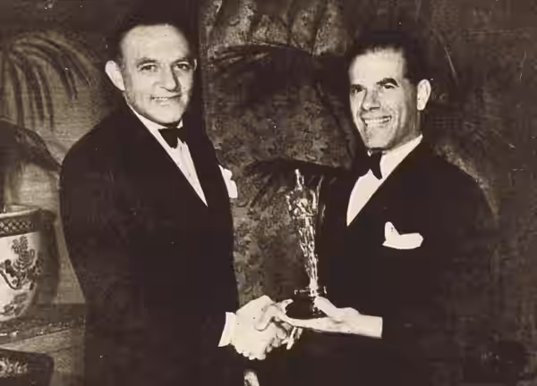 L-R: Columbia studio head Harry Cohn and director Frank Capra, who won best director for You Can't Take It With You|. Academy Award ceremonies for 1938 films wa (1941)