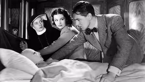 Promotional still from the 1938 film The Lady Vanishes, published in National Board of Review Magazine