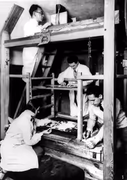 The German pioneer of silhouette animation film, Lotte Reiniger, with her husband and partner Carl Koch; Walter Türck and Alexander Kardan working at the multip