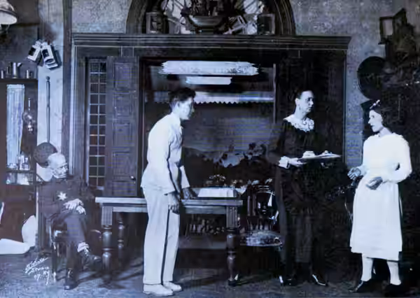 Philemon Tweedle (Donald Meek), Julian Castlebury (Gregory Kelly), Mrs. Albergone (Patti Cortez) and Winsora Tweedle (Ruth Gordon) in Act I of 'Tweedles' (1923)