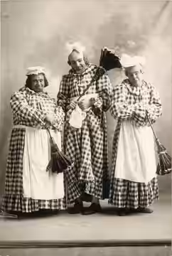 Kolb (center), Dill (left), and Dillon who opened June 25, 1905, at the Grand Opera House, Seattle. Subjects: entertainers
