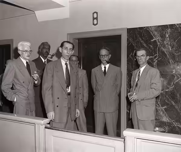 New York, Ny: Dashiell Hammett (1894-1961) Alpheus Hinton, Abner Green, Fredrick Vanderbilt Field, and unidentified U.S. Marshall. (1951)