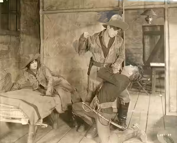 A scene from the American western film Told in the Hills (1919), which played at the Strand Theater, Seattle. Includes Robert Warwick. Dated Oct. 8, 1919. Subje