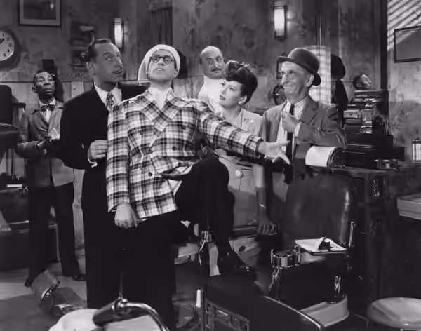 Left to right: unidentified, Franklin Pangborn, Harold Lloyd, Torben Meyer, Arline Judge, and Jimmy Conlin in The Sin of Harold Diddlebock (1947) - cropped scre