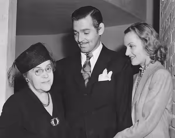 Photo of Clark Gable, Carole Lombard and Mrs. Elizabeth Peters, the mother of Carole Lombard. It was originally taken after Gable and Lombard returned from thei (1942)