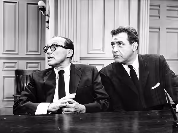 Press photograph for The Jack Benny Program broadcast "Jack On Trial for Murder" with guest star Raymond Burr in character as Perry Mason (1961)