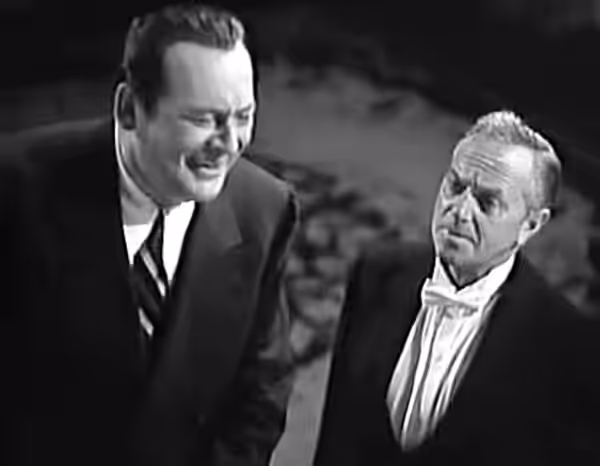 Edward Arnold and Stanley Ridges in American film Eyes in the Night (1942)