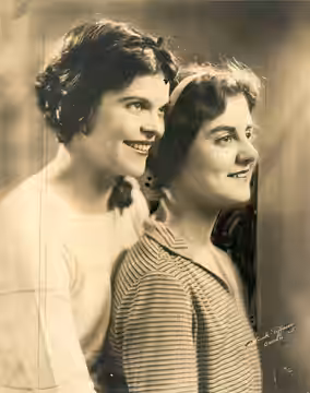 Dorothy Adams and Marion Clayton who played the twins in the play "Lilies of the Field." The Moroni Olsen players presented the play at the Metropolitan Theater (1927)