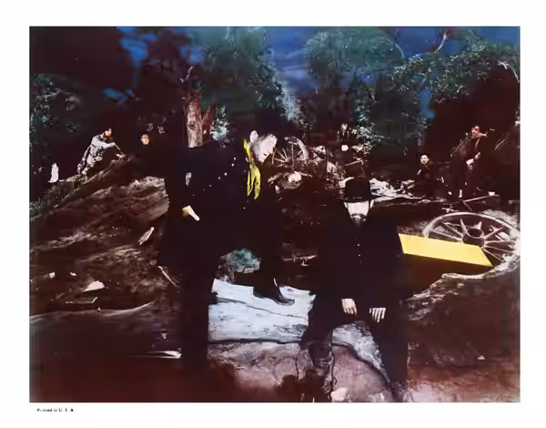 Colored lobby card for How the West Was Won (MGM, 1962) featuring John Wayne and Harry Morgan. Image is assumed to be in the public domain as no copyright notic