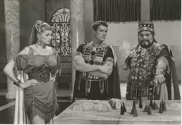 Anita Ekberg, Georges Marchal and Folco Lulli in a scene from Nel segno di Roma, a 1959 film directed by Guido Brignone.