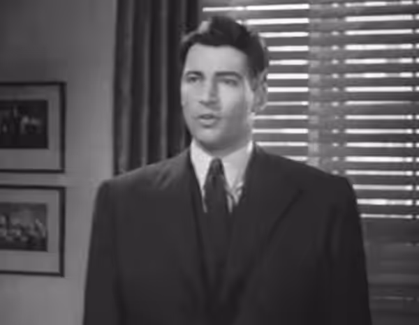 William Hooper in the American crime film Lady Gangster (1942) - cropped screenshot