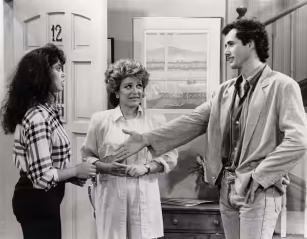DOUBLE SURPRISE - Steven Foreman (LEWIS SMITH), gets a surprise when he meets Laura (TERRI HATCHER, left), the 18-year-old daughter of his new love, Karen (PATT (1987)