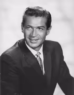 A studio portrait of George Nader, used to promote the short-lived television series, The Man and the Challenge