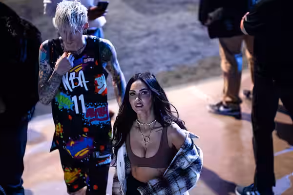 Machine Gun Kelly and Megan Fox walking together on February 18, 2022.