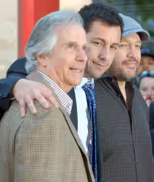Henry Winkler, Adam Sandler, and Kevin James at a ceremony for Sandler to receive a star on the Hollywood Walk of Fame. (2011)