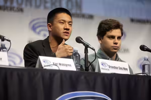 Brandon Soo Hoo and Jake T. Austin speaking at the 2017 WonderCon, for "Teen Titans: The Judas Contract", at the Anaheim Convention Center in Anaheim, Californi