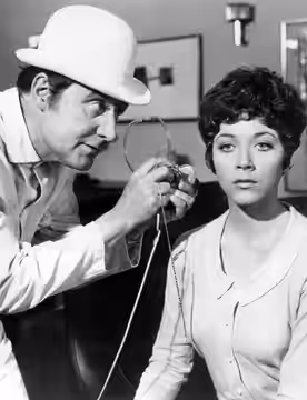 Publicity photo of Patrick Macnee and Linda Thorson from the television program The Avengers.
